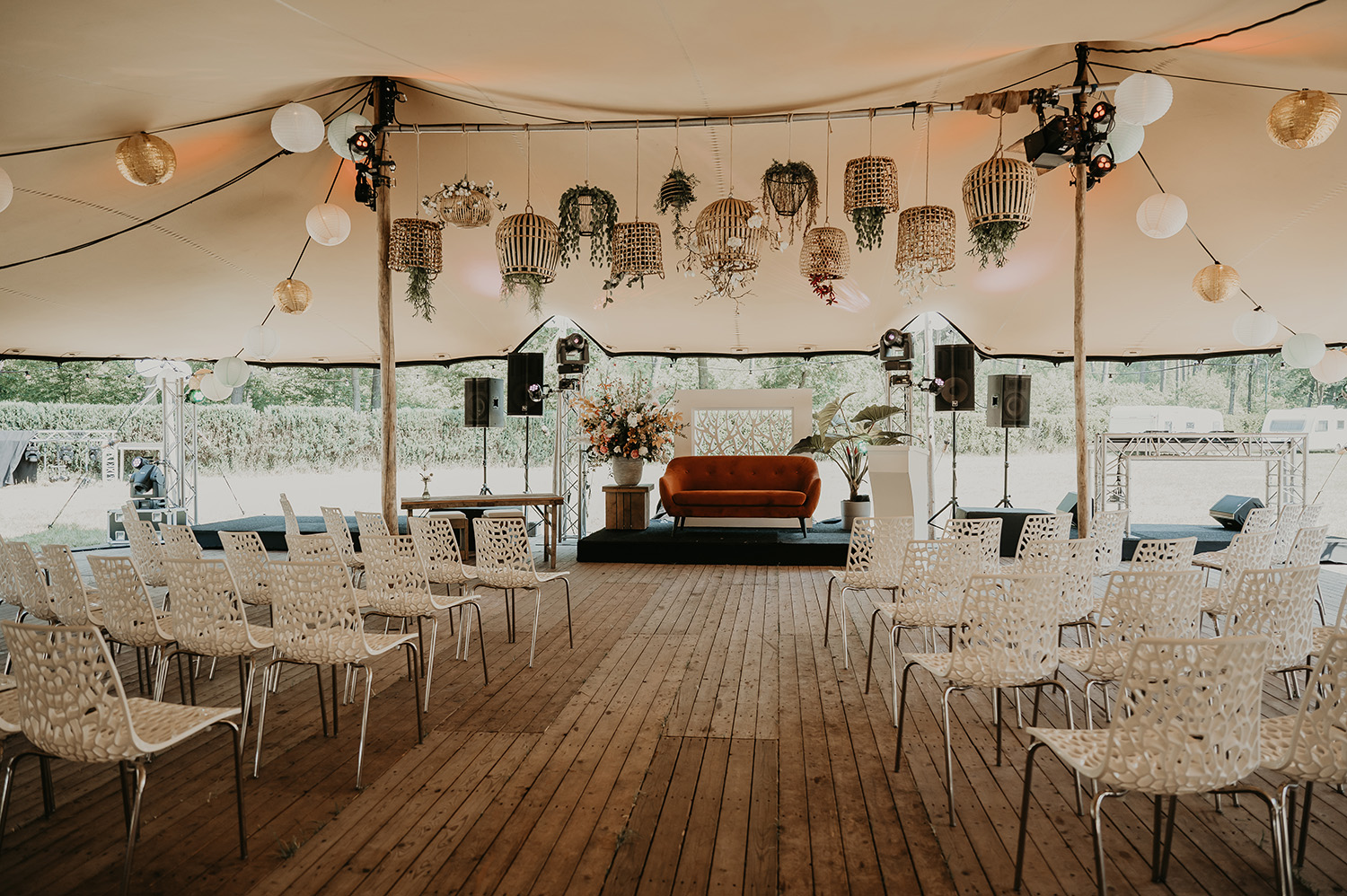 Qtents stretch tent for sale installed over an outdoor seating area